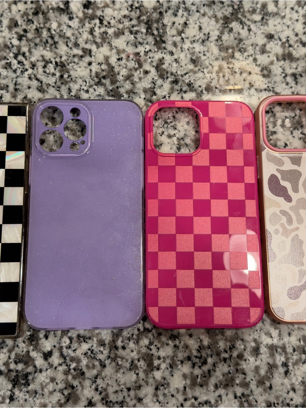 Multiple iPhone 13 Pro Max cases pop sockets etc